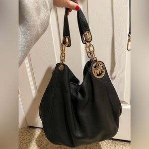 Michael kors purse. gently used. Good condition.